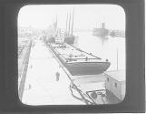 Oil tankers and barges at pier, Port Arthur, Texas