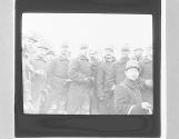 ZW. Belgian Infantry showing straw tied round helmets.