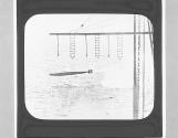 ZW. Firing torpedo from above surface.