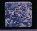 Unloading and cleaning fish from the herring boats crowded at the quay -Wick.