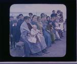 Wives and bairns of the sturdy toilers of the sea at Wick, centre of herring trade.