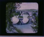 Old stone bridge mirrored in the storied River Forth at Stirling.