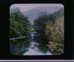 The "Brig o'Turk" over the glassy stream at Glenfinlas in the Trossachs.