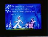 While stroll-ing through the park that day - He met a sweet "cher-ie" and say--