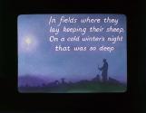 In fields where they lay keeping their sheep, ....
