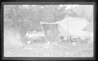 Josephine Dickman and Eastwoods at campsite table, Wyoming Trip