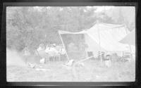 Josephine Dickman and Eastwoods at campsite table, Wyoming Trip
