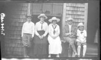 Drydens and Nell Newhall on porch, Oak Lodge Trip