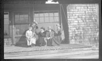 George Eastman and guests on porch, Oak Lodge Trip