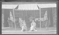 George Eastman and friends on porch, Oak Lodge Trip