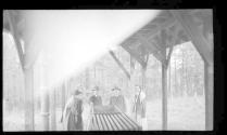 George Eastman and guests inspecting hog prep area, Oak Lodge Trip