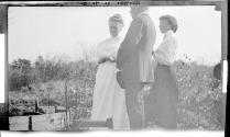 Hubbells and Mary Mulligan in field, Oak Lodge Trip