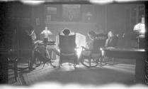 Guests by fireplace, Oak Lodge Trip