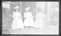 Marie Willard, May Gifford and Josephine Dickman on porch, Oak Lodge Trip