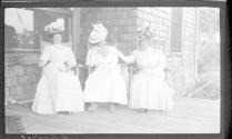 Marie Willard, May Gifford and Josephine Dickman on porch, Oak Lodge Trip