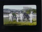[Chapin and his Korean guides on carriages pulled by men]