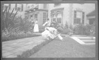 Ellen Dryden with her children in Eastman's garden