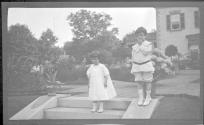 Dryden children in Eastman's garden