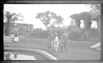 Dryden children and Watson Newhall in Eastman's garden
