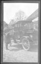 Two men near automobile, Oak Lodge Trip