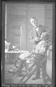 Dentist working inspecting African American girl at Eastman School, Oak Lodge Trip