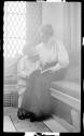 Woman in Conservatory with George Eastman Dryden