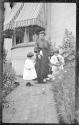 Ellen Dryden on Eastman's porch with Ellen Maria Dryden and George Eastman Dryden