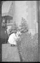 Ellen Dryden and children in Eastman's garden