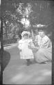 Woman & girl on Eastman's porch