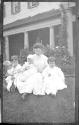 Nell and Watson Newhall in Eastman's garden with Dryden children