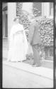George Eastman handing Nell Newhall a diploma