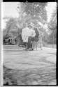 Dryden children with George Andrus in Eastman's garden