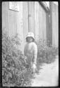 [Child by wall]