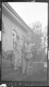 Phil and Mrs. Percival on front steps, Parklands, B.E.A., African Safari