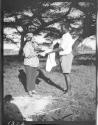 Osa Johnson commends Caseroni on baking bread, African Safari