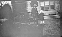 George Eastman and Dryden children in garden