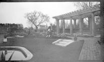 George Eastman and Dryden children in garden