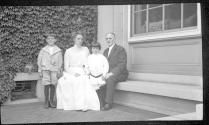 Dryden family and George Eastman in garden