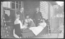 George Eastman and guests on porch, Oak Lodge Trip