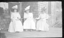Marie Willard, May Gifford and Josephine Dickman on porch, Oak Lodge Trip