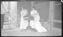 May Gifford, Marie Willard and Josephine Dickman arranging flowers, Oak Lodge Trip