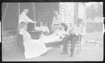 George Eastman and guests on porch, Oak Lodge Trip