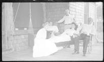 Guests on porch, Oak Lodge Trip