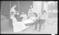 George Eastman and guests on porch, Oak Lodge Trip