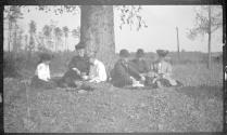 GE and friends seated outdoors