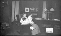 Woman holding Dryden children