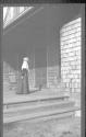 Maria Eastman on porch, Oak Lodge Trip