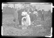 George Eastman and guests inspecting cornerstone of cabin, Oak Lodge Trip