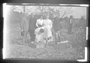 George Eastman and guests inspecting cornerstone of cabin, Oak Lodge Trip