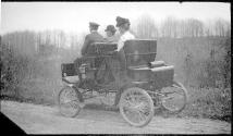 Group in a Stanley Steamer